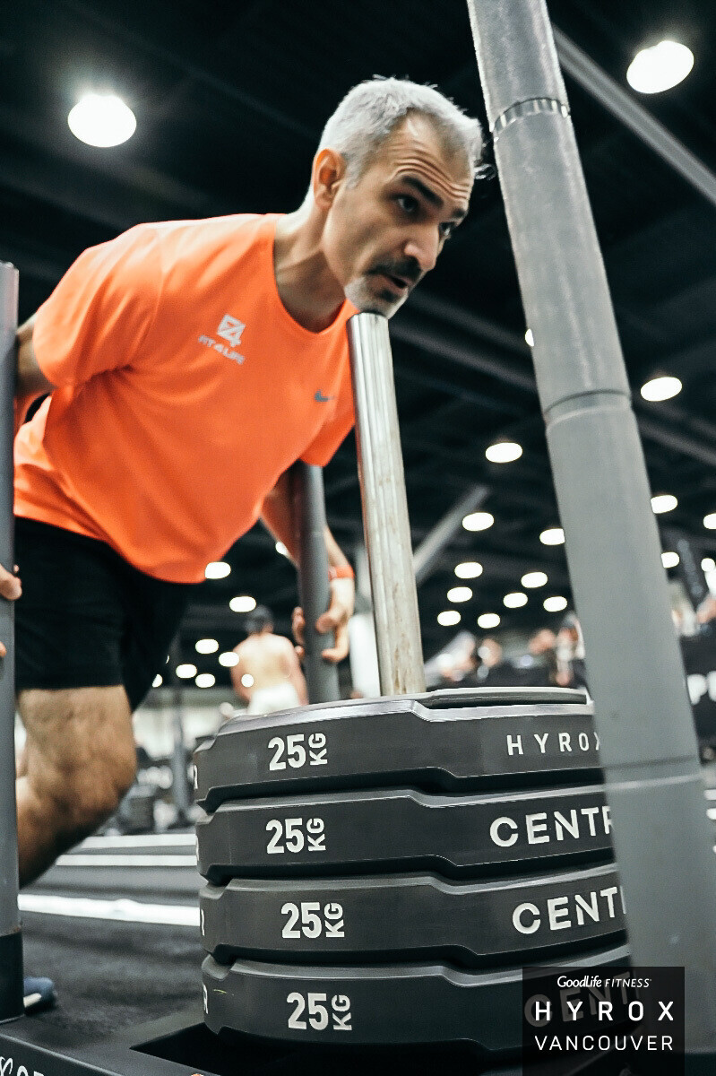 Fit4Life athlete training on a HYROX sled
